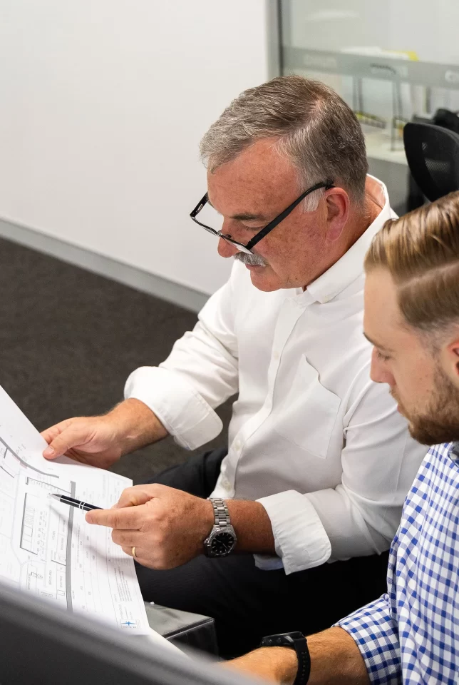 Civium commercial property managers looking at plans