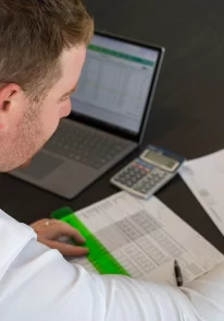 Civium team member looking at financials